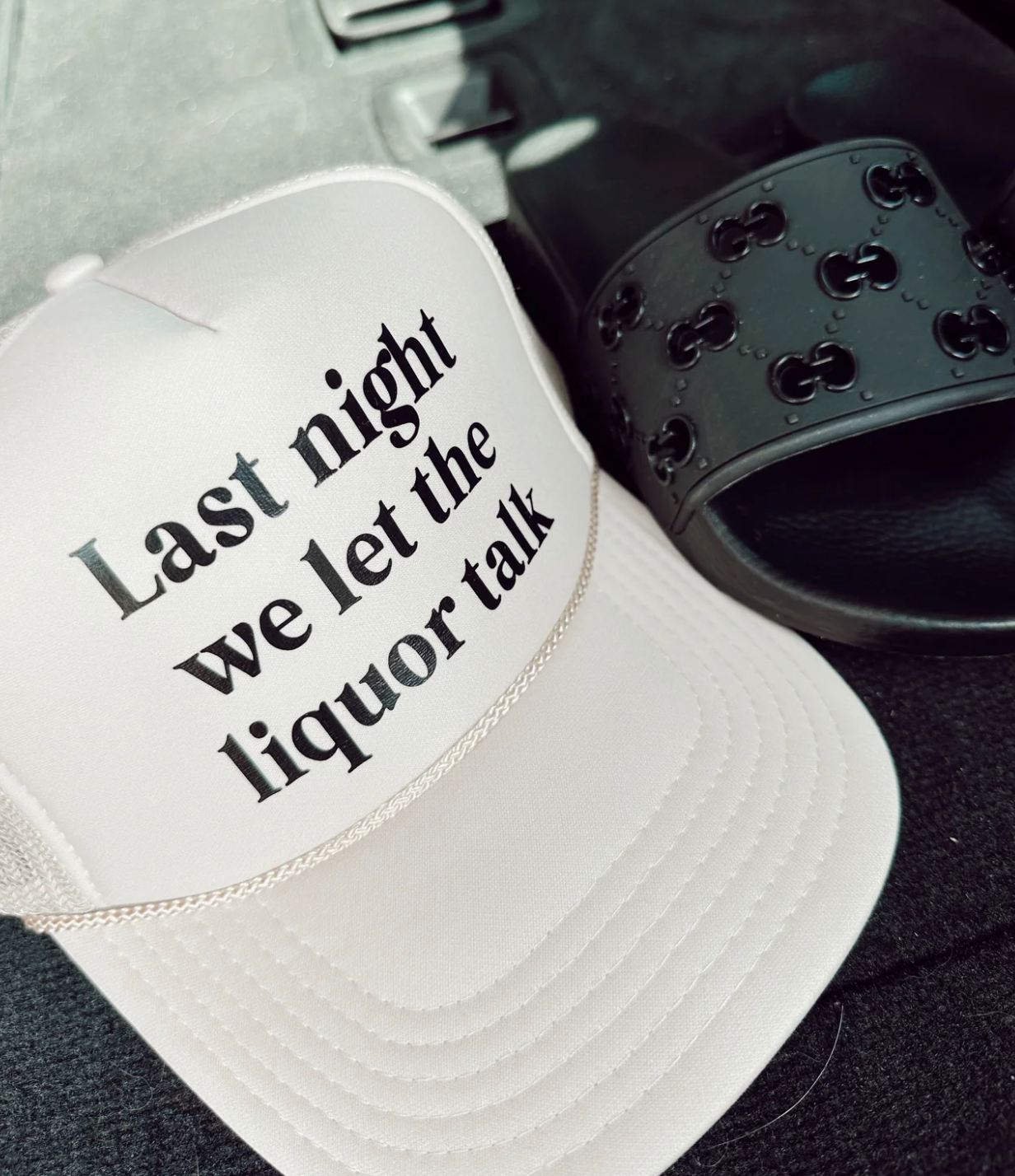 Last Night We Let The Liquor Talk Trucker Hat