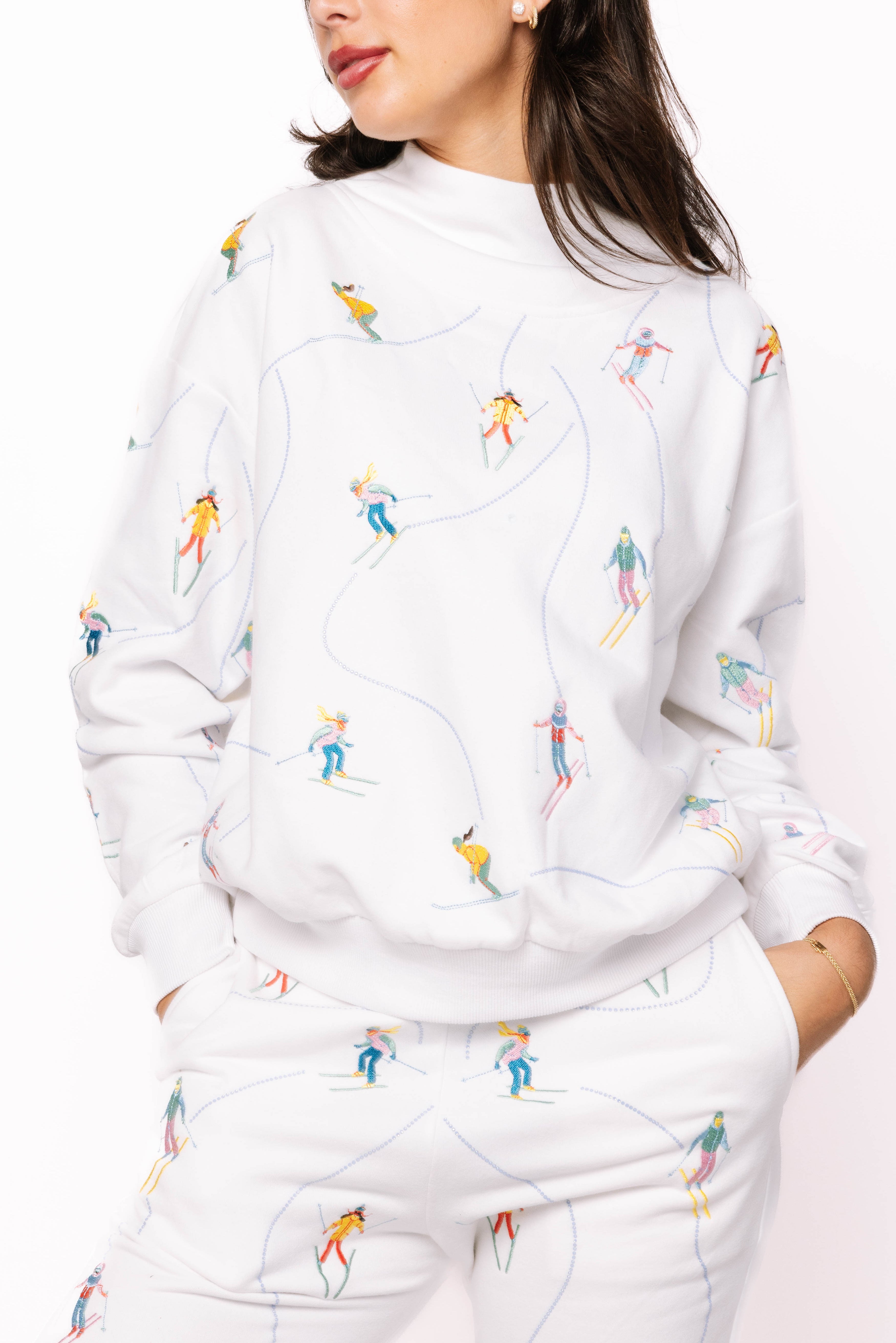 White Multi Skier Snow Path Mock Neck Sweatshirt | Queen of Sparkles